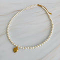 Pearl And Gold Bauble Heart Necklace